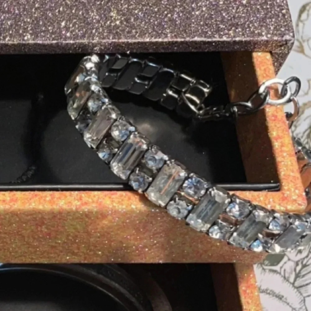 VINTAGE CLEAR STONE BAGUETTE  SILVERTONE BANGLE WITH SECURITY CHAIN